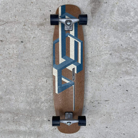 Loaded Basalt Tesseract con Trucks CX